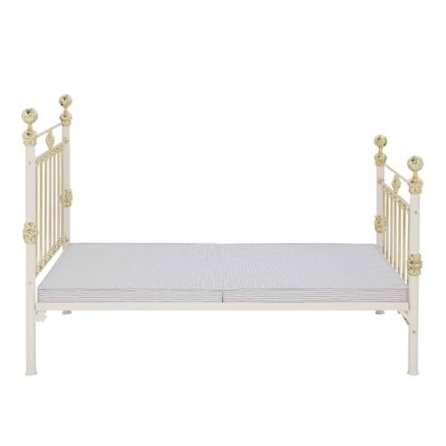 platform top base on victorian style iron and brass bed