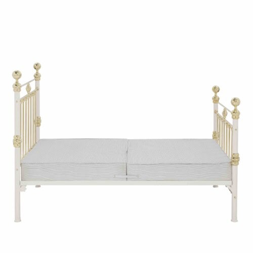 sprung bed base on victorian style iron and brass bed