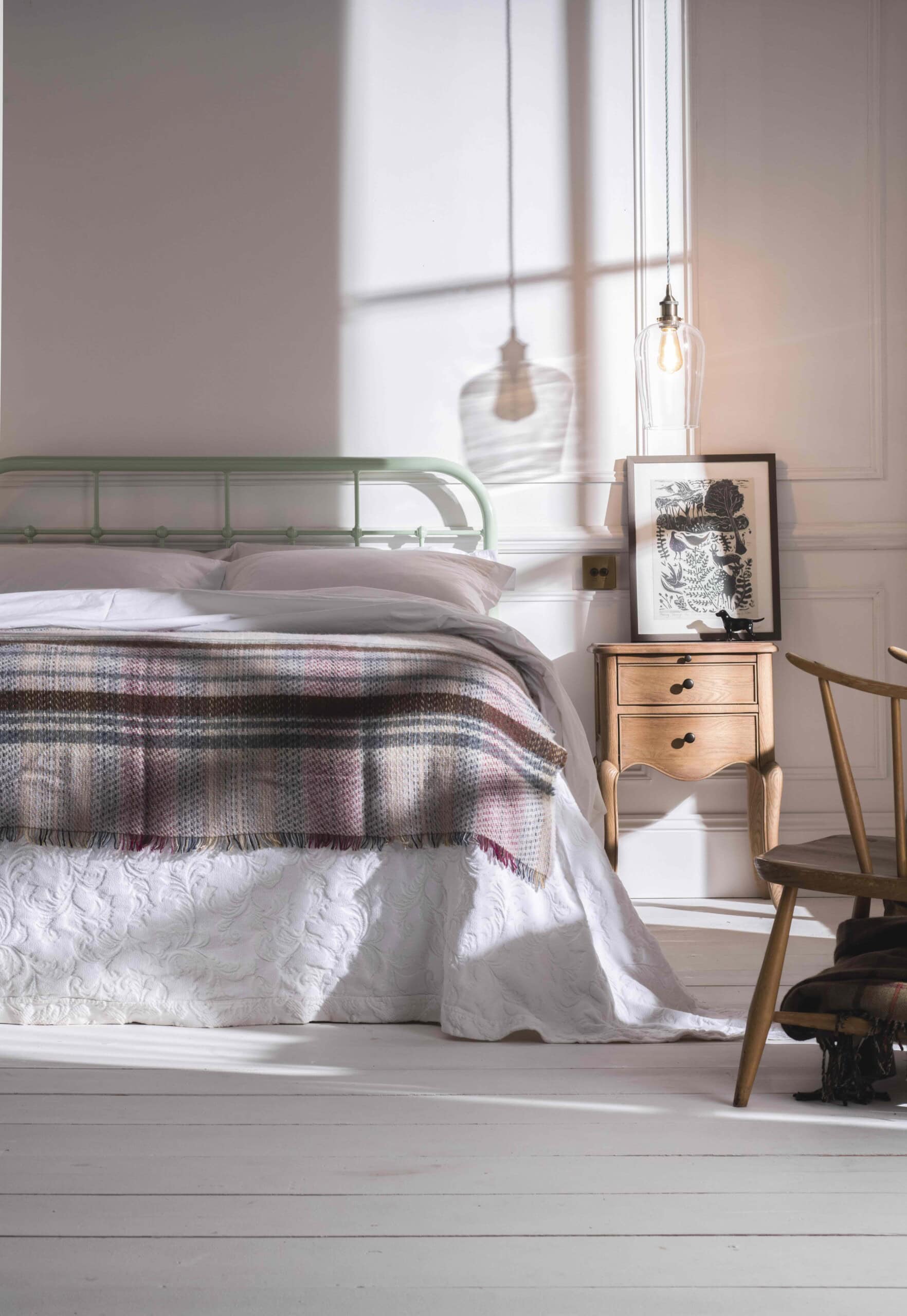 green iron bed with bedroom lighting glass pendants