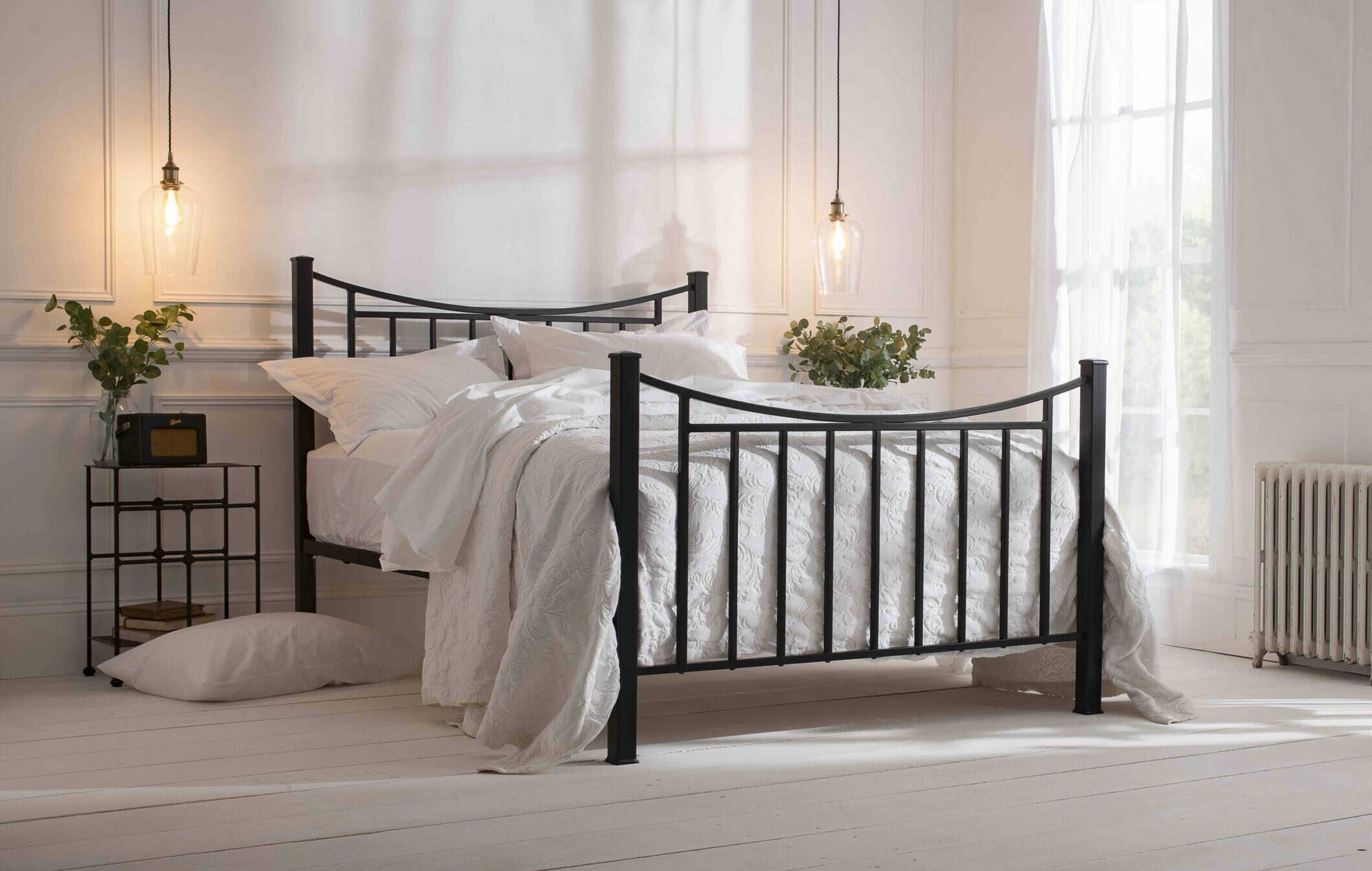 Inca iron bed with hanging glass pendants bedroom lighting