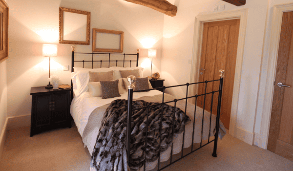 Iron Bed in Cozy Interior